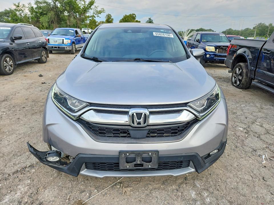 Photo 5 from auction – 2017 HONDA CR-V with VIN 7FARW1H86HE028313