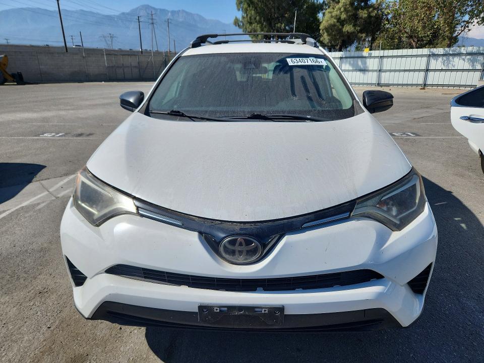 Photo 5 from auction – 2018 TOYOTA RAV4 with VIN 2T3ZFREV2JW415106