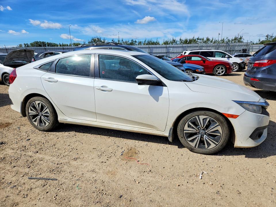 Photo 4 from auction – 2017 HONDA CIVIC with VIN 2HGFC1F40HH107625