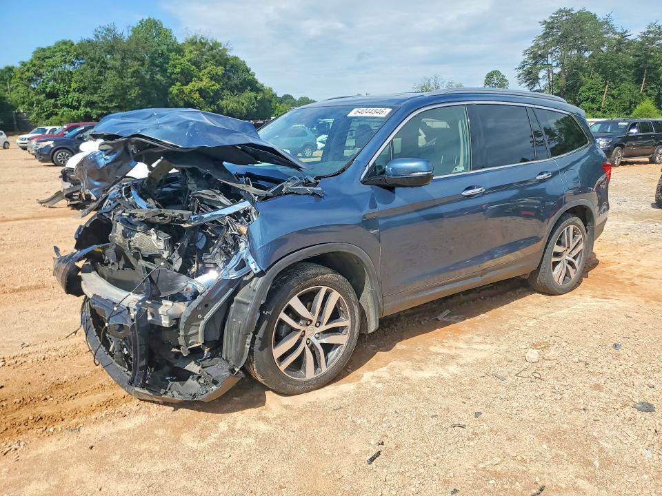 HONDA PILOT 2017 with VIN 5FNYF6H03HB089634 - Photo from auction
