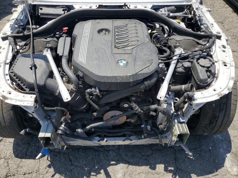 Photo 11 from auction – 2023 BMW 840XI with VIN WBAGV4C08PCN00805