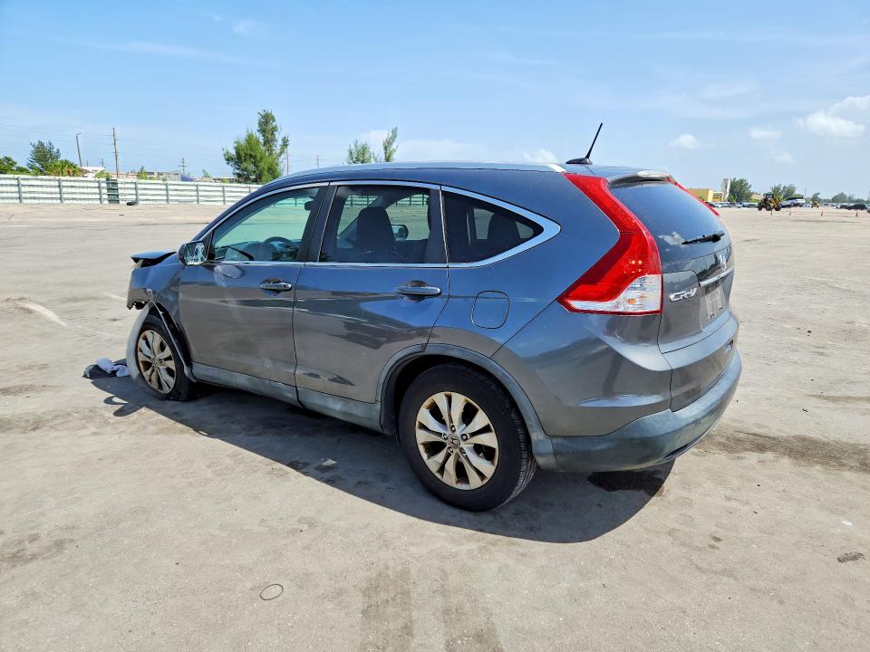 Photo 2 from auction – 2014 HONDA CR-V with VIN 5J6RM3H7XEL015572