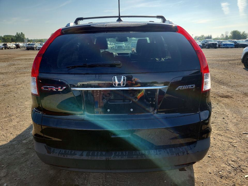 Photo 6 from auction – 2012 HONDA CR-V with VIN 5J6RM4H95CL800053