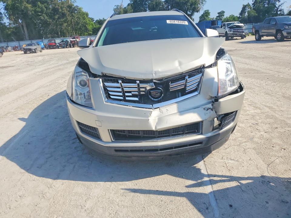 Photo 5 from auction – 2013 CADILLAC SRX with VIN 3GYFNAE32DS607742