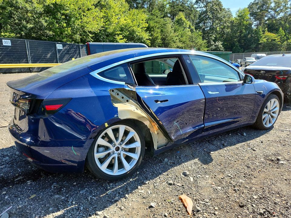 Photo 3 from auction – 2018 TESLA MODEL 3 with VIN 5YJ3E1EA5JF033391