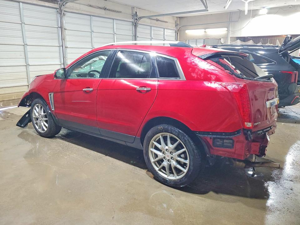 Photo 2 from auction – 2014 CADILLAC SRX with VIN 3GYFNDE39ES520472