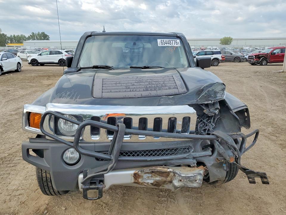 Photo 5 from auction – 2009 HUMMER H3 with VIN 5GTEN13E098103818