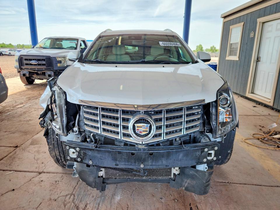 Photo 5 from auction – 2015 CADILLAC SRX with VIN 3GYFNBE33FS623716