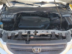 Photo 12 from auction – 2003 HONDA PILOT with VIN 2HKYF185X3H586463