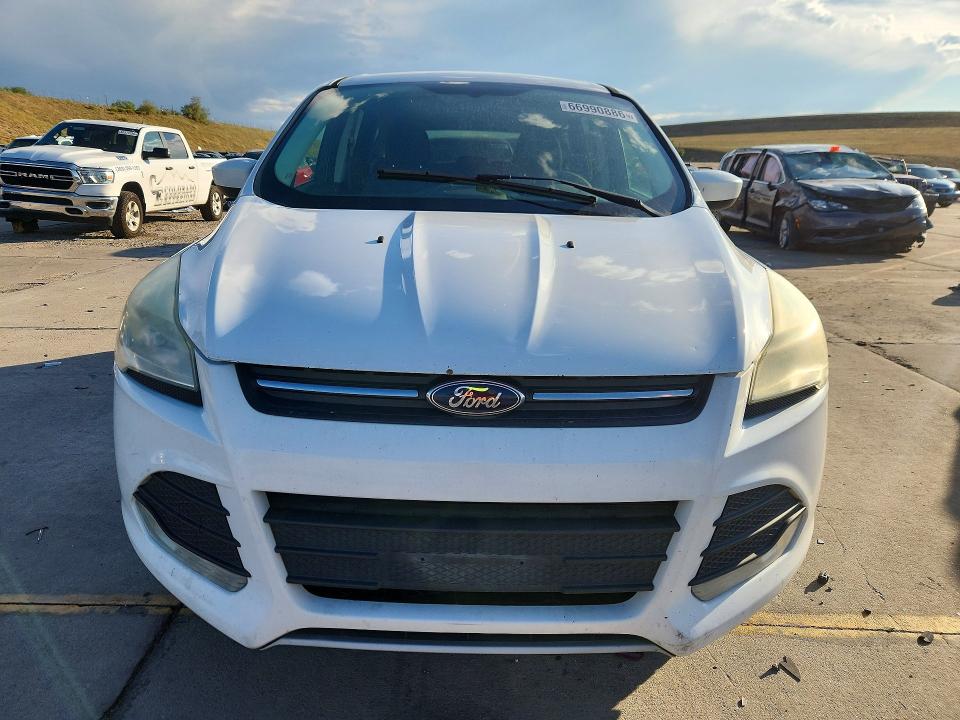 Photo 5 from auction – 2016 FORD ESCAPE with VIN 1FMCU9G97GUA32212