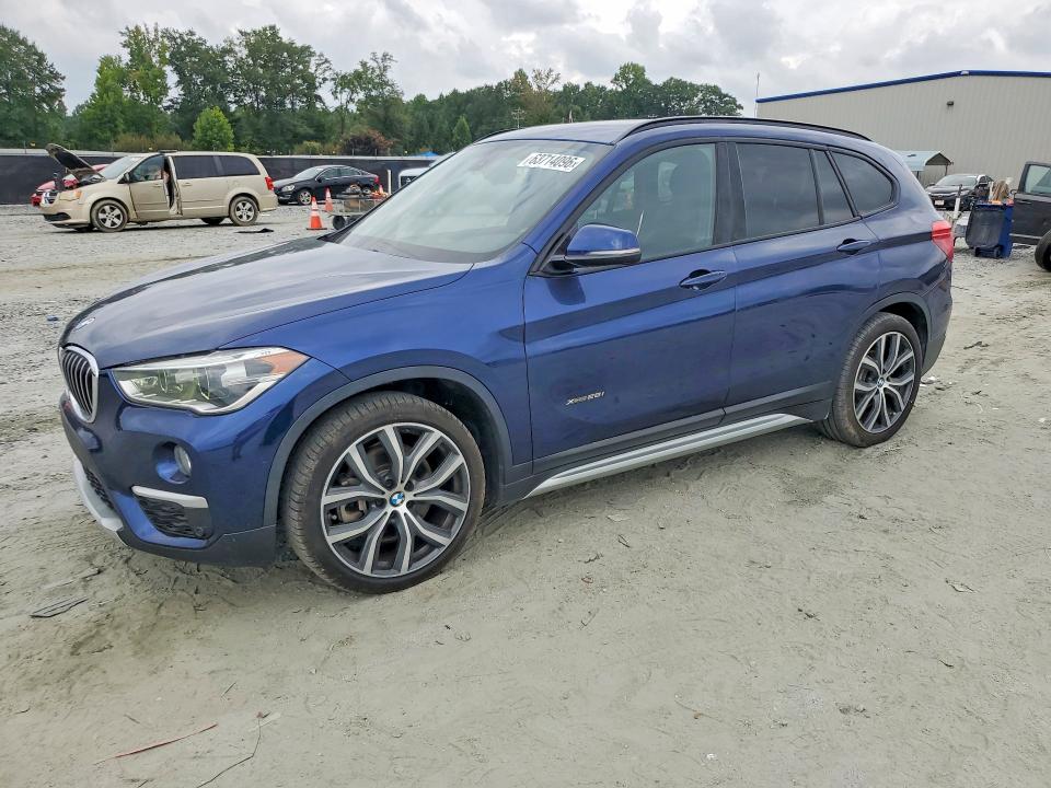 BMW X1 2017 with VIN WBXHU7C30H5H36432 - Photo from auction