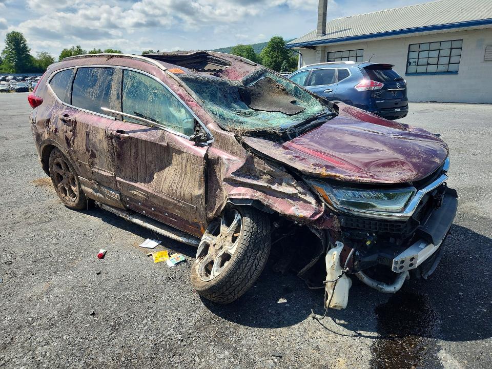 Photo 4 from auction – 2017 HONDA CR-V with VIN 2HKRW2H98HH680930