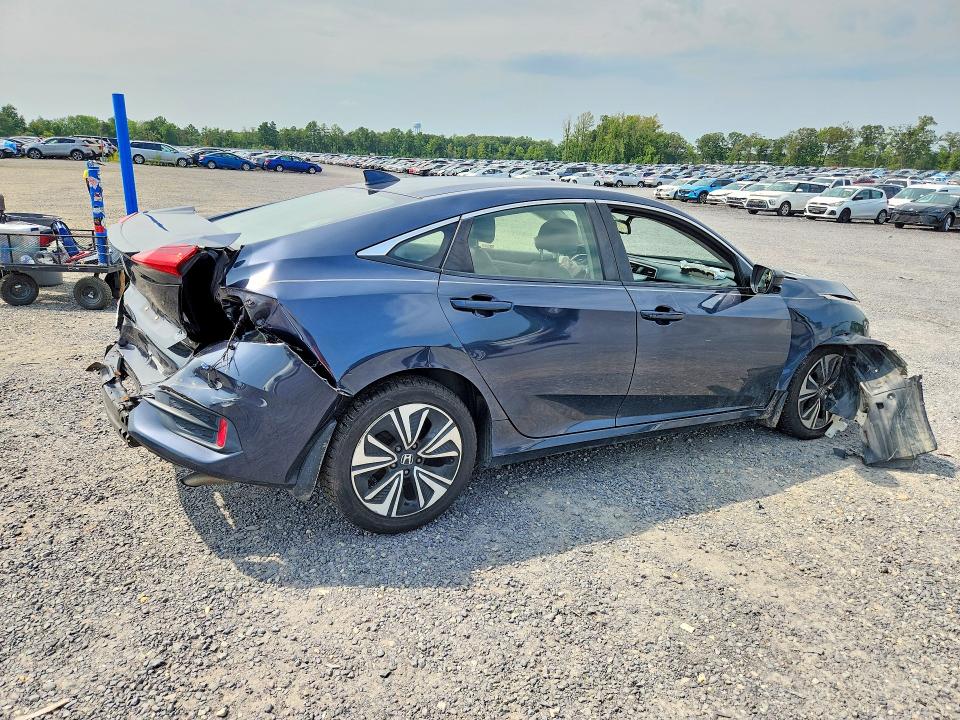 Photo 3 from auction – 2018 HONDA CIVIC with VIN JHMFC1F89JX043862