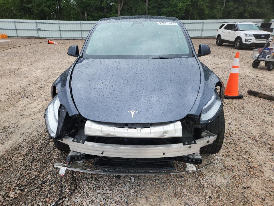 Снимка 5 от търг – 2023 TESLA MODEL Y с VIN 7SAYGDEE3PA042930