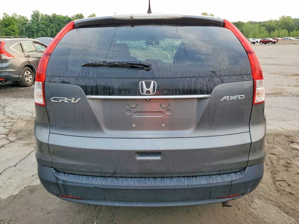 Photo 6 from auction – 2013 HONDA CR-V with VIN 2HKRM4H56DH646722