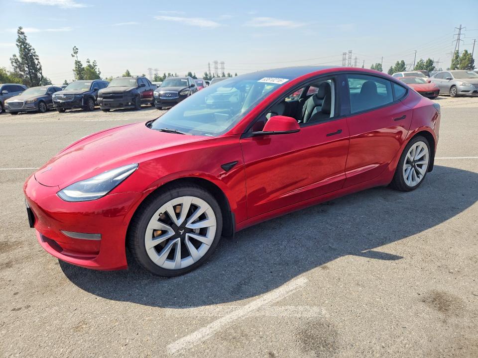 TESLA MODEL 3 2022 with VIN 5YJ3E1EA9NF143530 - Photo from auction