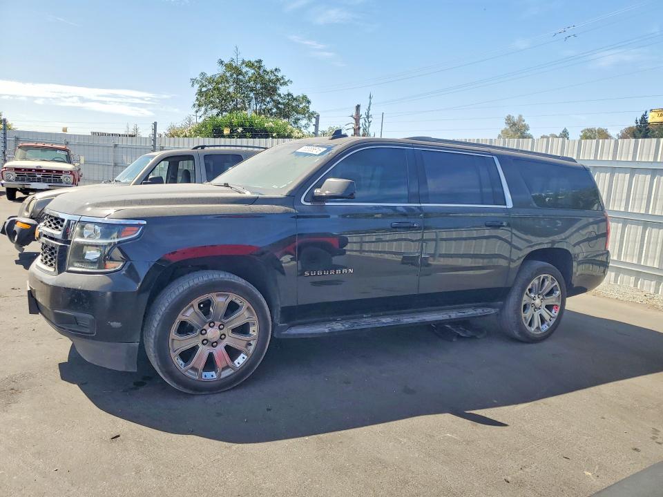 CHEVROLET SUBURBAN 2019 with VIN 1GNSCHKCXKR403690 - Photo from auction