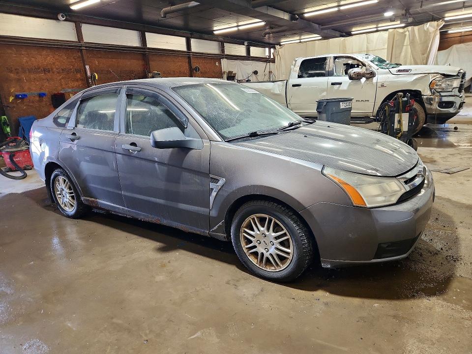 Photo 4 from auction – 2010 FORD FOCUS with VIN 1FAHP3FNXAW140810