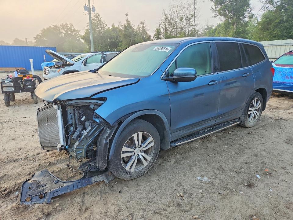 HONDA PILOT 2017 with VIN 5FNYF5H69HB021658 - Photo from auction