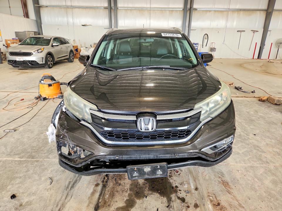 Photo 5 from auction – 2015 HONDA CR-V with VIN 2HKRM4H73FH625489
