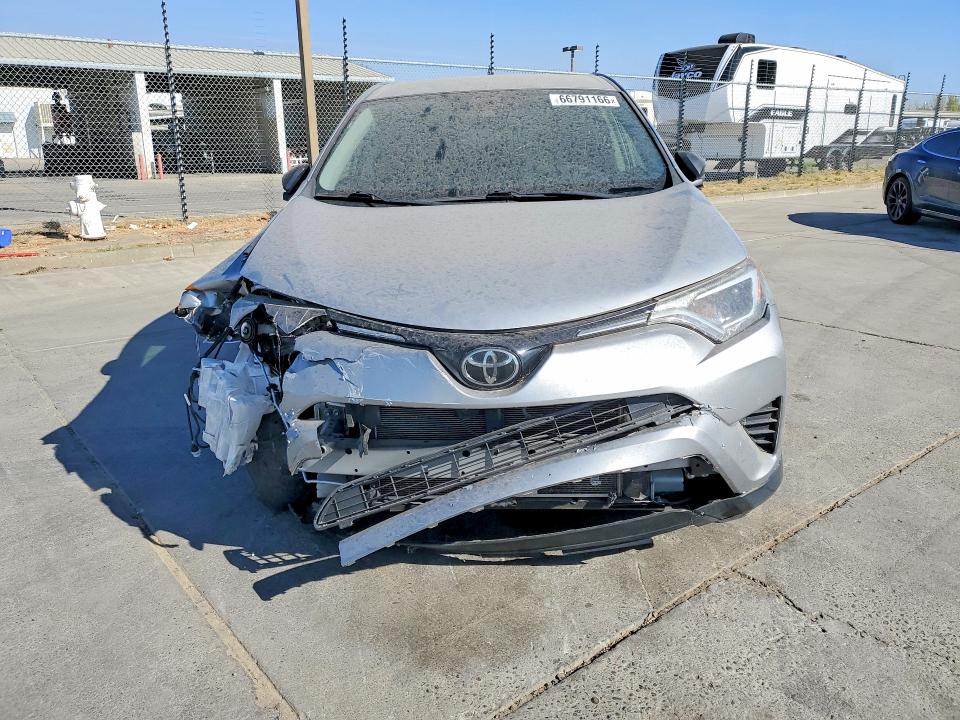 Photo 5 from auction – 2018 TOYOTA RAV4 with VIN JTMZFREVXJJ161837
