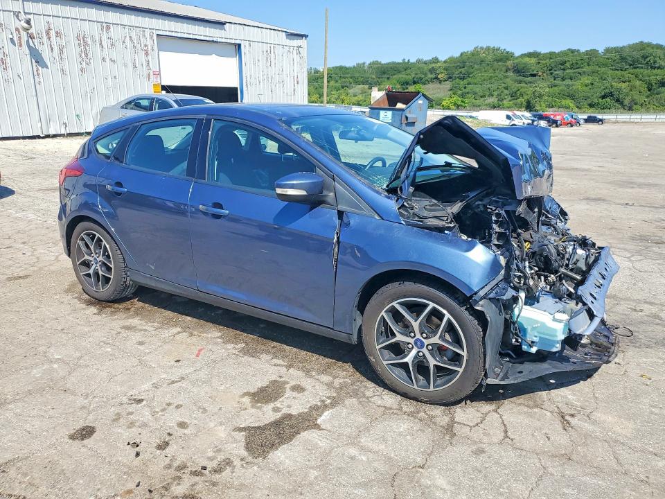 Photo 4 from auction – 2018 FORD FOCUS with VIN 1FADP3M28JL243975