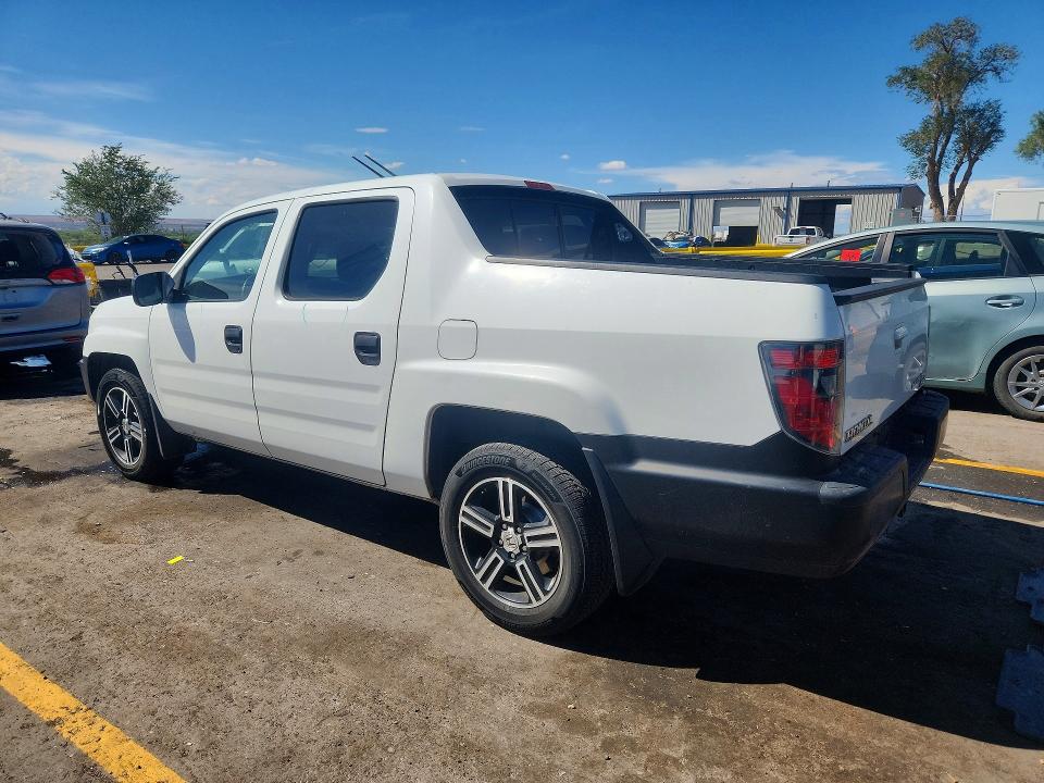 Photo 2 from auction – 2014 HONDA RIDGELINE with VIN 5FPYK1F73EB009427
