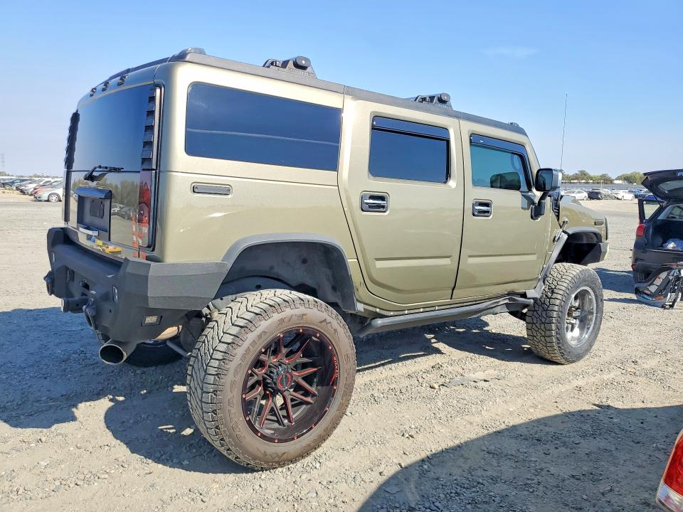 Фото 3 с аукциона – 2005 HUMMER H2 с VIN 5GRGN23U25H104734