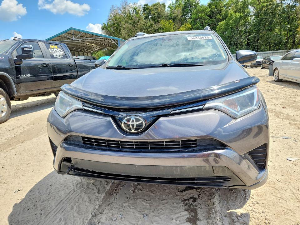 Photo 5 from auction – 2017 TOYOTA RAV4 with VIN JTMZFREV5HJ702271