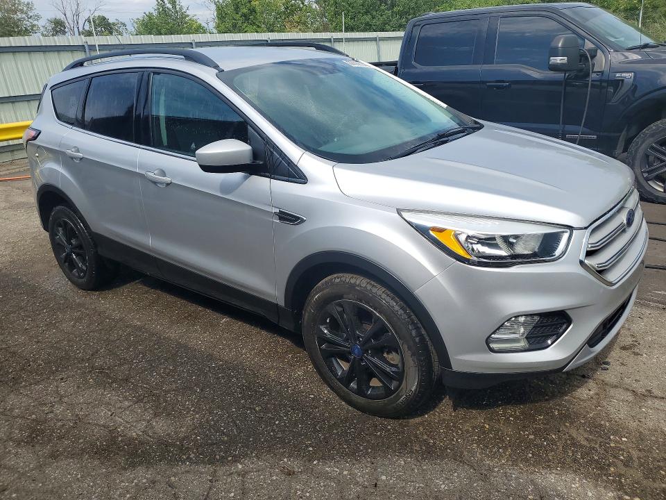 Photo 4 from auction – 2018 FORD ESCAPE with VIN 1FMCU9GD3JUA82620