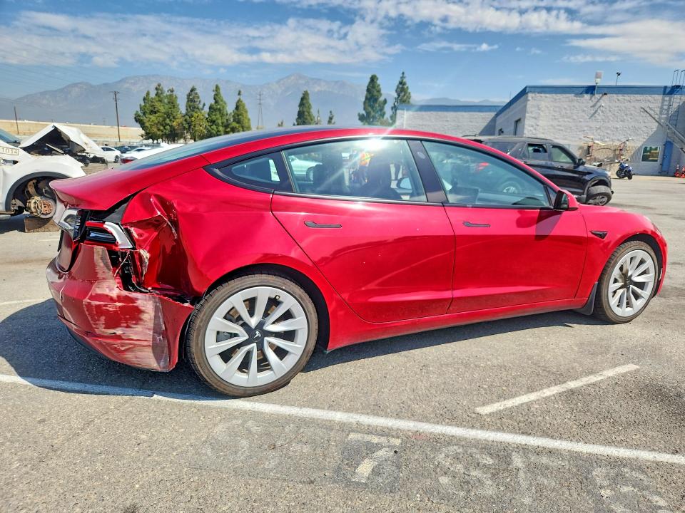 Photo 3 from auction – 2022 TESLA MODEL 3 with VIN 5YJ3E1EA9NF143530