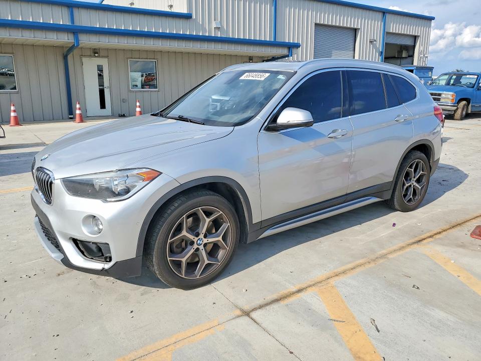 BMW X1 2018 with VIN WBXHU7C38J3H43856 - Photo from auction