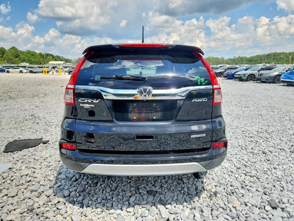 Photo 6 from auction – 2016 HONDA CR-V with VIN 5J6RM4H95GL003792