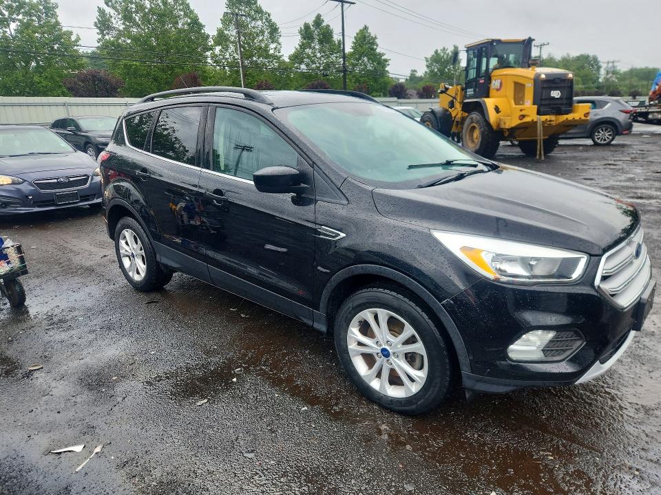 Photo 4 from auction – 2018 FORD ESCAPE with VIN 1FMCU9GDXJUB17136