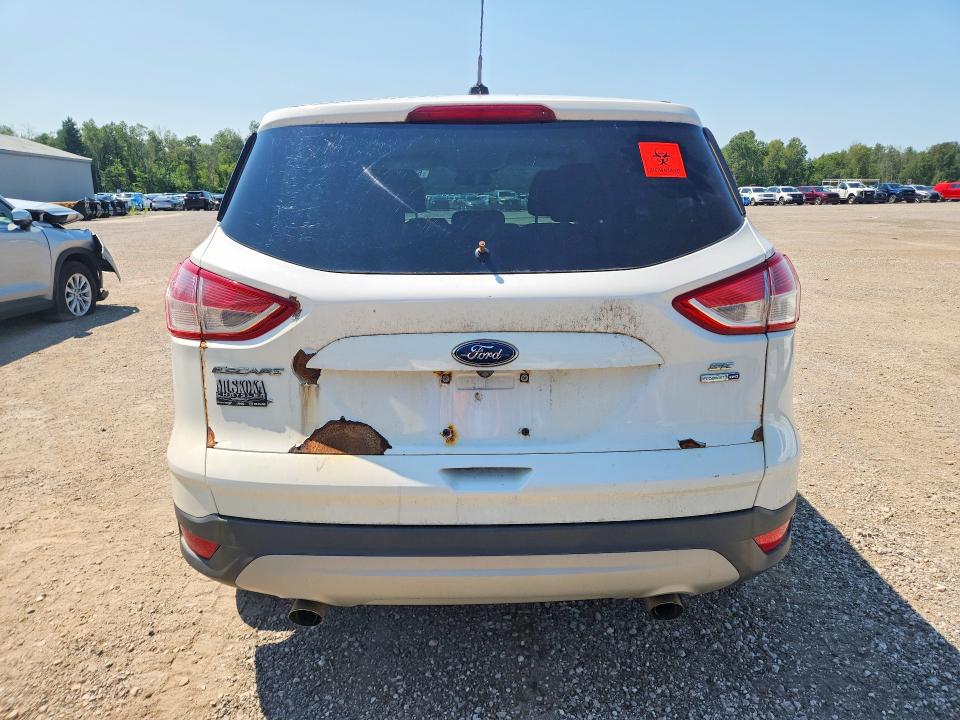 Photo 6 from auction – 2016 FORD ESCAPE with VIN 1FMCU9GX8GUA41287