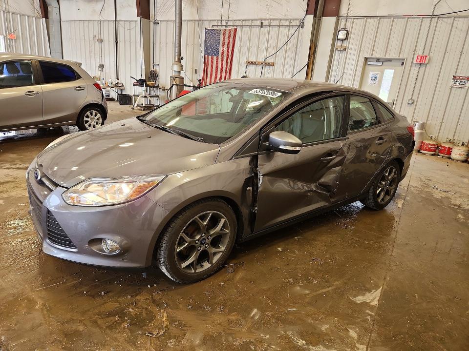 FORD FOCUS 2014 with VIN 1FADP3F29EL194675 - Photo from auction