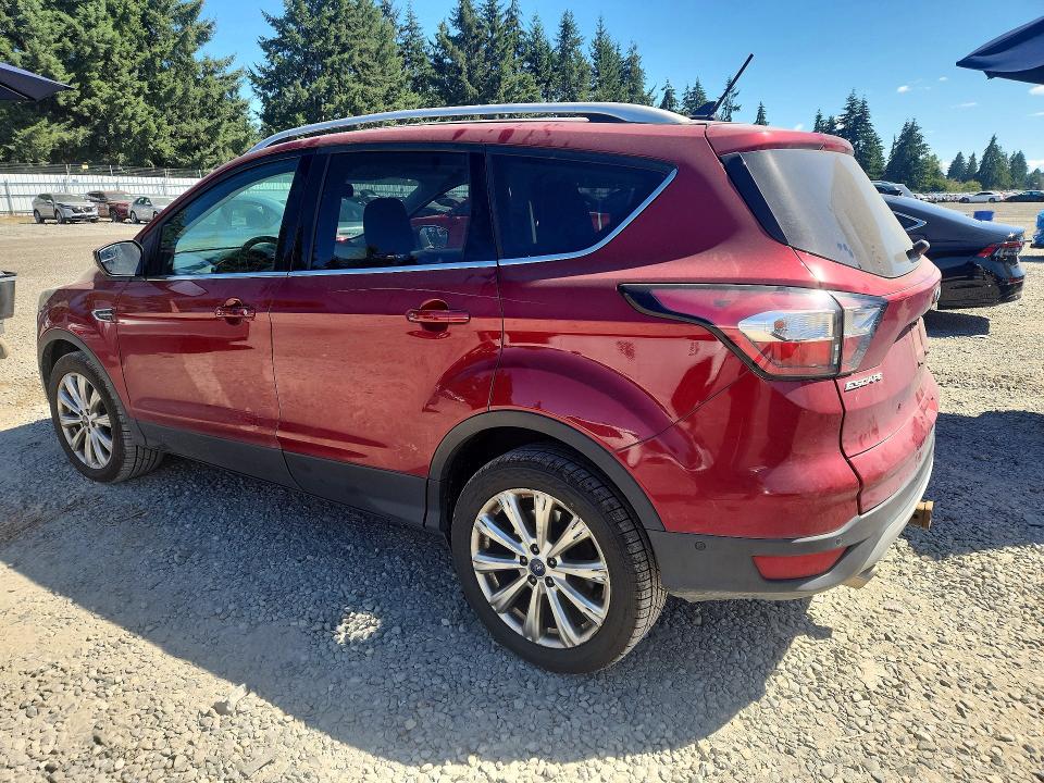 Photo 2 from auction – 2018 FORD ESCAPE with VIN 1FMCU9J91JUA65111