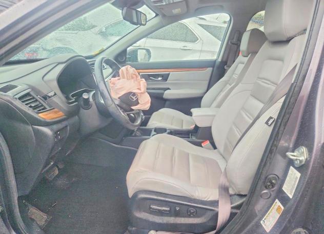 Photo 7 from auction – 2018 HONDA CR-V with VIN 7FARW2H87JE085177