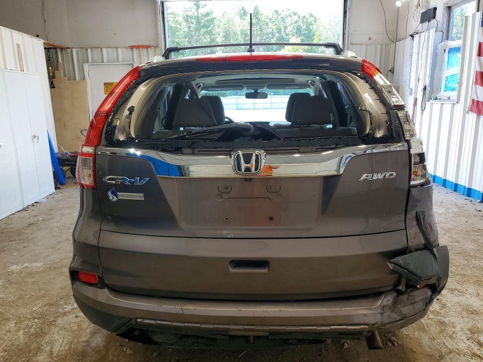 Photo 6 from auction – 2016 HONDA CR-V with VIN 2HKRM4H56GH721892