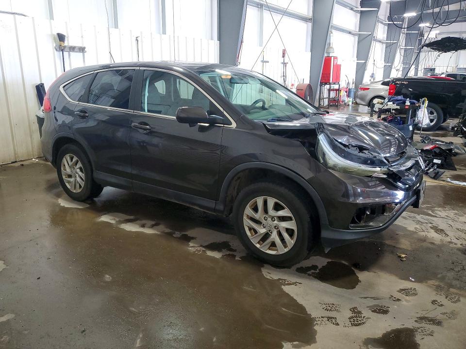 Photo 4 from auction – 2015 HONDA CR-V with VIN 2HKRM4H58FH608685