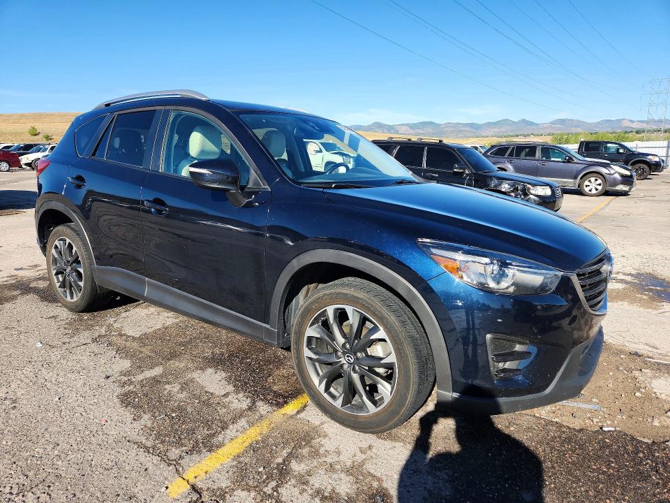 Photo 4 from auction – 2016 MAZDA CX-5 with VIN JM3KE4DY5G0603027