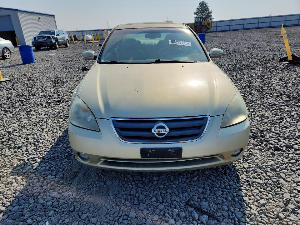 Фото 5 с аукциона – 2002 NISSAN ALTIMA с VIN 1N4BL11E72C129036