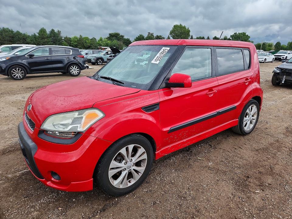 KIA SOUL 2011 with VIN KNDJT2A22B7299556 - Photo from auction