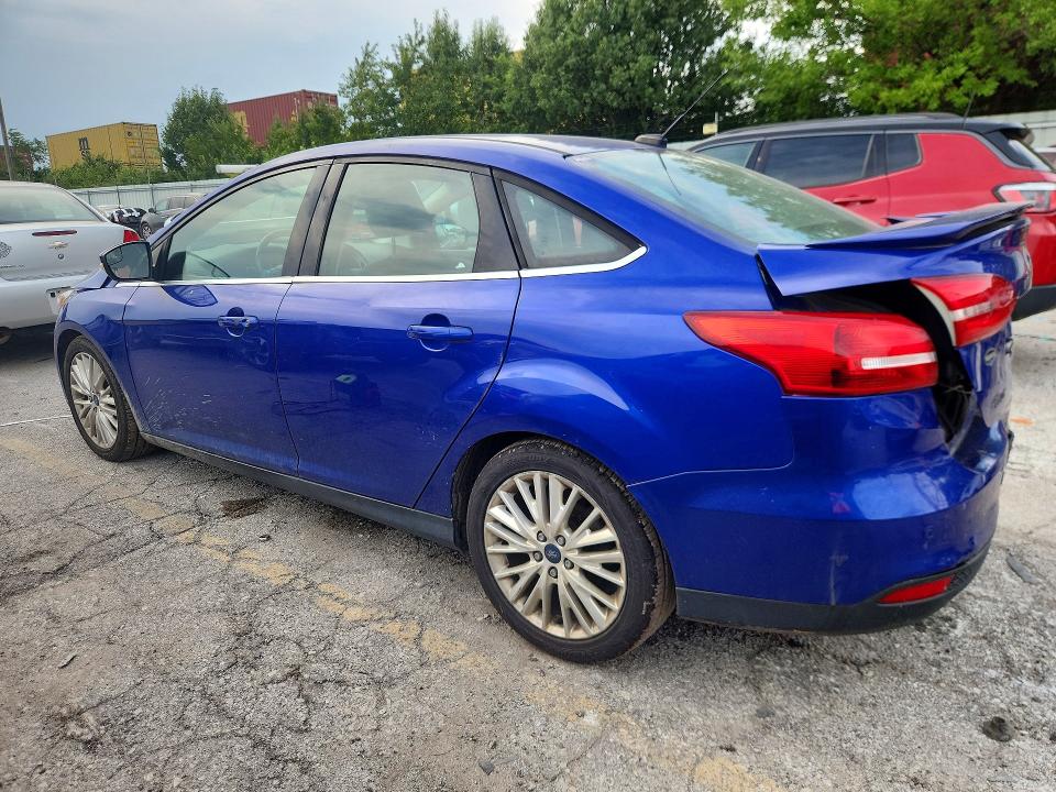 Photo 2 from auction – 2015 FORD FOCUS with VIN 1FADP3J24FL339520