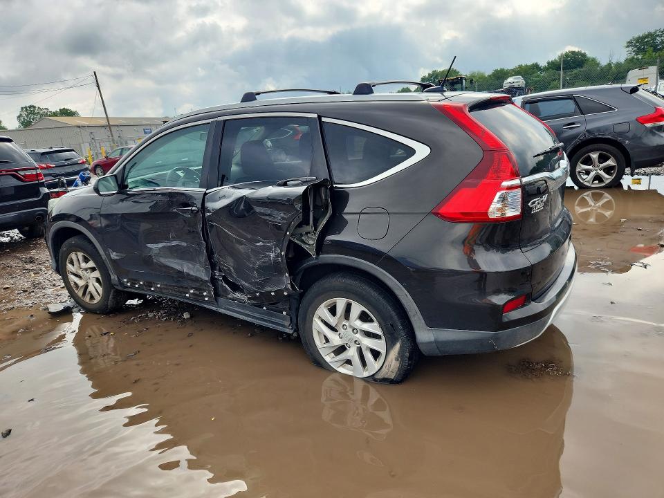 Photo 2 from auction – 2016 HONDA CR-V with VIN 2HKRM4H75GH724672