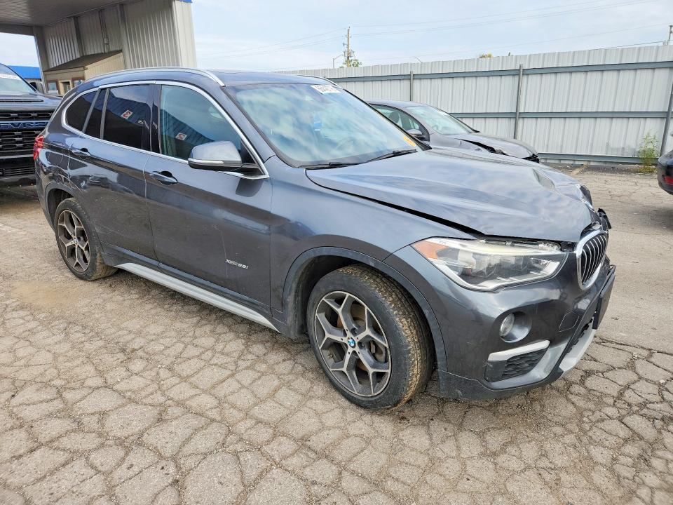 Photo 4 from auction – 2016 BMW X1 with VIN WBXHT3C3XG5E47908