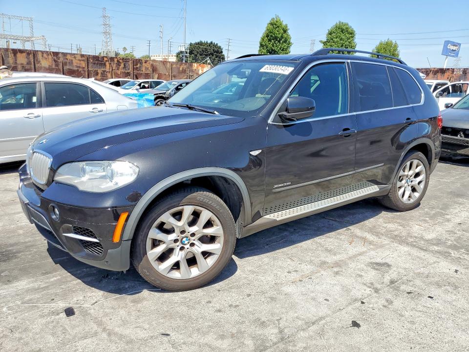 BMW X5 2013 with VIN 5UXZV4C5XD0B21021 - Photo from auction