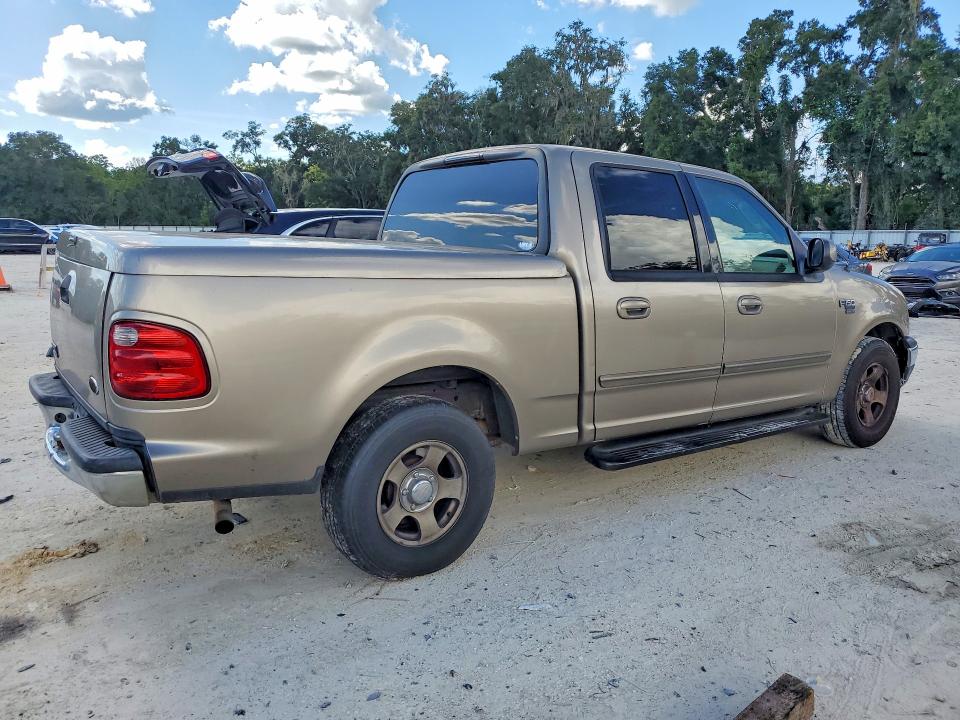 Photo 3 from auction – 2002 FORD F150 with VIN 1FTRW076X2KE17987