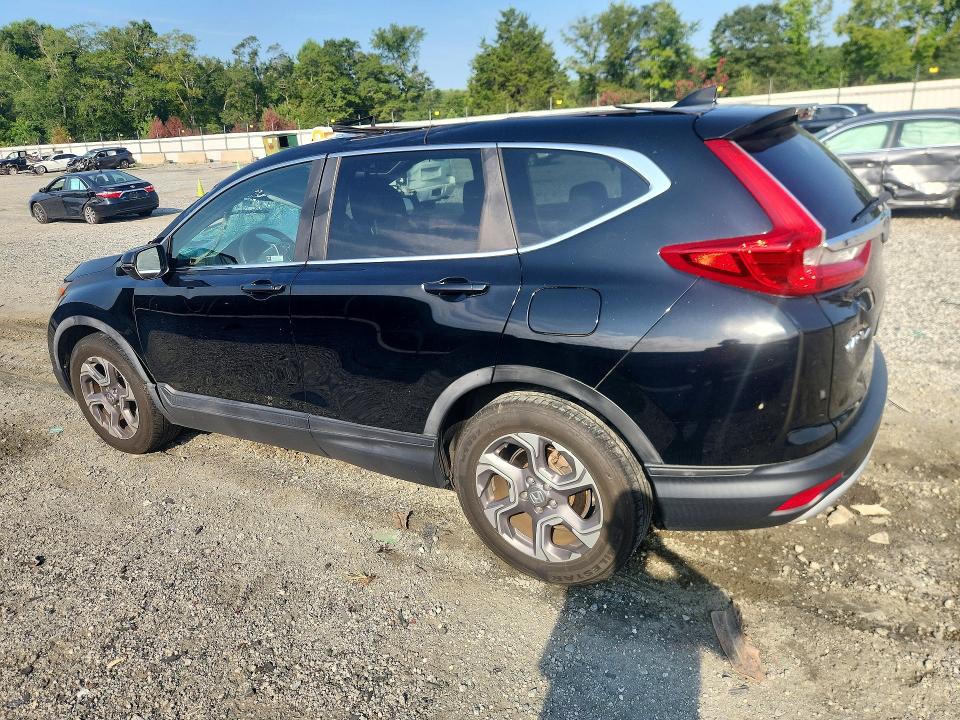 Photo 2 from auction – 2018 HONDA CR-V with VIN 7FARW1H81JE025454