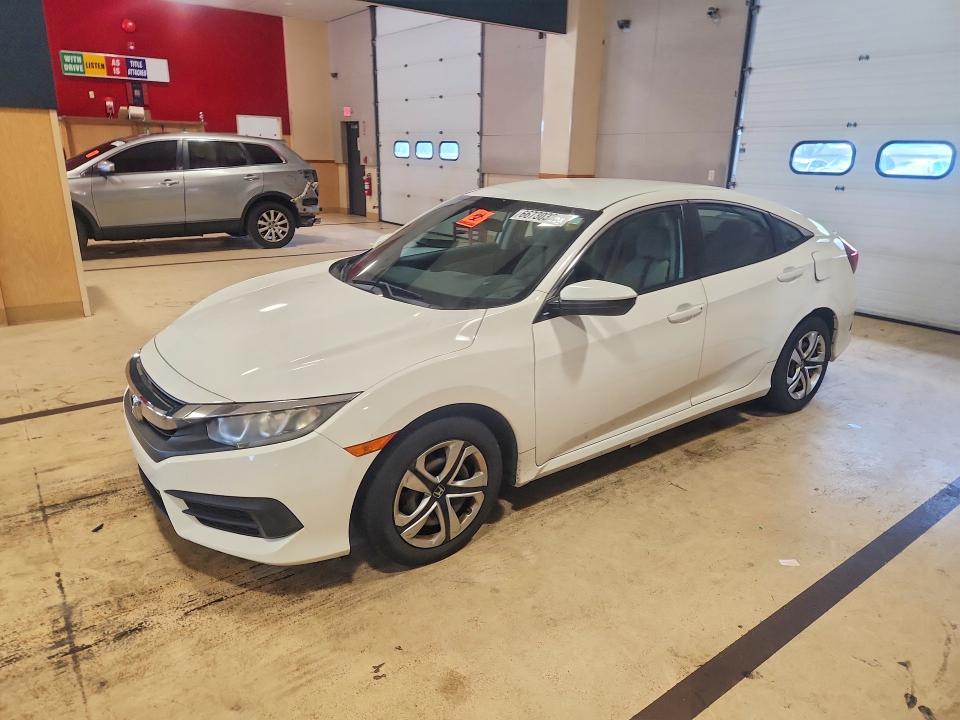 HONDA CIVIC 2016 with VIN 19XFC2F58GE242911 - Photo from auction